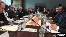 Somali Finance Minister Abdirahman Duale Beileh (right) is seen with participants of International Monetary Fund (IMF) and World Bank meetings last week in Washington. (Twitter - @DrBeileh)