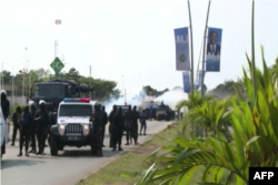 Protesters clash with police in the Rio district of Libreville, Gabon, August 31, 2016.