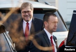 FILE - U.S. Attorney General William Barr leaves his house after Special Counsel Robert Mueller found no evidence of collusion between U.S. President Donald Trump’s campaign and Russia in the 2016 election in McLean, Virginia, March 25, 2019.