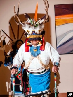 This May 26, 2018 photo provided by the Museum of Northern Arizona shows a performance of a deer dance at the Zuni Festival of Arts and Culture in Flagstaff, Ariz. (Ryan Williams/Museum of Northern Arizona via AP)