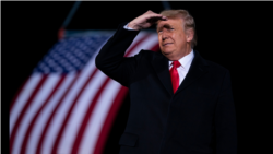 President Donald Trump arrives to speak at a campaign rally for Sen. Kelly Loeffler, R-Ga., and David Perdue at Dalton Regional Airport, Jan. 4, 2021, in Dalton, Ga.