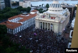 Thousands of people gather to mourn Rio de Janeiro's city councillor Marielle Franco, 38, who was shot dead, outside State Assembly in Rio de Janeiro, Brazil, March 15, 2018.