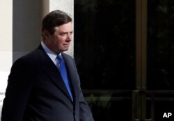 FILE - Paul Manafort leaves U.S. District Court in Washington, Oct. 30, 2017.
