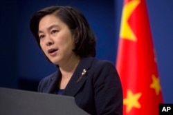 Chinese Foreign Ministry spokeswoman Hua Chunying speaks during a briefing at the Chinese Foreign Ministry in Beijing, China, Jan. 6, 2016.