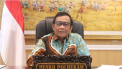 Menko Polhukam Mahfud Md saat memberi keterangan pers tentang bantuan ke India (Tangkapan layar YouTube Kemenko Polhukam RI)