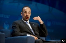 FILE - Saudi Aramco President and CEO Khalid Al-Falih speaks at the IHS CERAWEEK energy conference, March 5, 2013, in Houston.