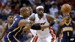 Miami Heat's LeBron James says he wants Donald and Shelly Sterling out of the NBA as soon as possible