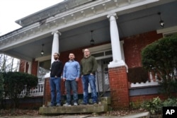 Three men who are covered under Medicaid at a residential treatment program in Catlettsburg, Kentucky, a state that receives $2.35 for every $1 it sends to the federal government.