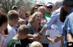 Residents affected by Hurricane Harvey are visited by Vice President Mike Pence during a visit to the First Baptist Church of Rockport, Aug. 31, 2017, in Rockport, Texas.
