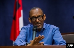 FILE - Rwanda's President and RPF Chairman Paul Kagame gives a press conference after presenting his credentials as presidential candidate for the upcoming elections in Kigali, June 22, 2017.