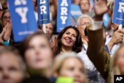 Supporters watch as Democratic presidential nominee Hillary Clinton speaks during the final day of the Democratic National Convention in Philadelphia, July 28, 2016.