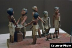 An early-Egyptian carving, held at the Rosecrucian-Egyptian Museum in California, depicts beer-making. (Wikipedia Commons)