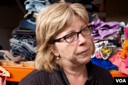 Anne Duflot-Allievi, president of the charity Secours Populaire, says unemployment and resulting poverty among Hayange residents have given rise to feelings of defeat and despair. (R. James/VOA)