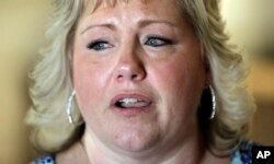 Laurie Holt speaks during an interview at her home, June 28, 2017, in Riverton, Utah.