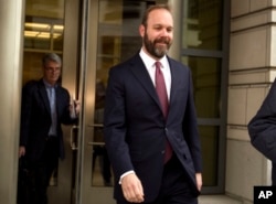 Rick Gates leaves US federal court house in Washington D.C. after pleading guilty to lying and conspiracy charges, Feb. 23, 2018.