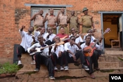 Members of the Prison Reform Band outside their makeshift recording studio at the Zomba maximum-security prison in eastern Malawi. (Credit: L. Masina/VOA)