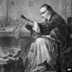 A print of master violin maker Antonio Stradivari (1644-1737) examining an instrument.
