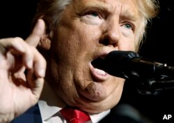 Republican presidential candidate Donald Trump speaks during a campaign rally at the South Florida Fairgrounds and Convention Center in West Palm Beach, Fla., Oct. 13, 2016.