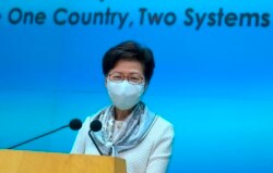 Pemimpin Eksekutif Hong Kong Carrie Lam dalam konferensi pers di Hong Kong, 11 Maret 2021.