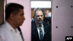 Harvey Weinstein exits the Manhattan Criminal Court room in New York.