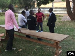 As of 7:30 am there had still been no ballots delivered to this polling station at Makerere University, Feb. 18, 2016. (J. Craig/VOA)