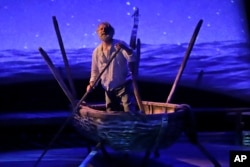 Actor Anthony Crivello plays the role of Santiago in a stage adaptation of Ernest Hemingway's "The Old Man and the Sea" during a dress rehearsal at the Pittsburgh Playhouse in Pittsburgh, Jan. 27, 2019.