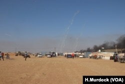 Tear gas rained down from drones every few minutes at a protest in Gaza, May 15, 2018.