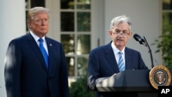 FILE - U.S. Federal Reserve board member Jerome Powell speaks after President Donald Trump announced him as his nominee to be the chair of the Federal Reserve in Washington, Nov. 2, 2017. “I know interest rates much better than they do,” Trump said of the Fed on Feb. 12, 2025.