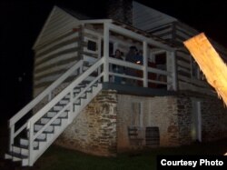 Alice Keesey Mecoy, a descendant of John Brown, historian Dennis Frye and an unidentified man are seen at the Kennedy Farm, Oct. 16, 2009, prior to a re-enactment of a march to Harpers Ferry, West Virginia. (Photo by Fred Mecoy)