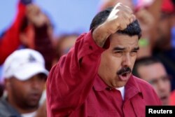 FILE - Venezuela's President Nicolas Maduro in Caracas, Venezuela, Aug. 14, 2017.