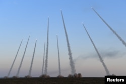 Artilleries are fired during a military drill in Qingtongxia, Ningxia Autonomous Region, China September 25, 2017.