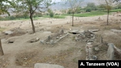 Local police dug up Daesh (Islamic State) graves to show locals they were not martyrs.