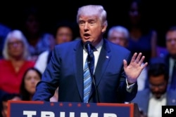 Republican presidential candidate Donald Trump speaks during a campaign rally at Merrill Auditorium, Aug. 4, 2016, in Portland, Maine.