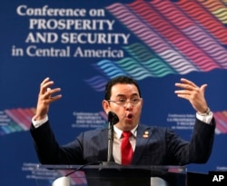 The President of Guatemala Jimmy Morales speaks during a conference on Prosperity and Security in Central America, June 15, 2017, in Miami.