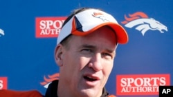 Denver Broncos quarterback Peyton Manning talks to the media Jan. 23, 2014.