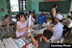 US AID deworming clinic in Vietnam's Bac Giang Province. Vietnam is another country where people have a high risk of contracting roundworm.