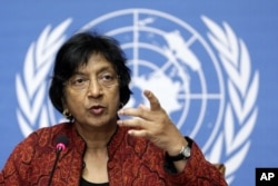 U.N. High Commissioner for Human Rights South African Navanethem Pillay gestures during a press conference at the European headquarters of the United Nations in Geneva (file)