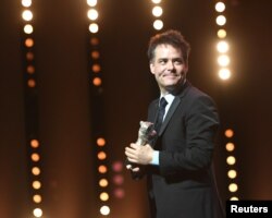 Director Sebastian Lelio receives the Silver Bear for Best Script for movie "A Fantastic Woman" during the awards ceremony at the 67th Berlin International Film Festival in Berlin, Germany, Feb. 18, 2017.