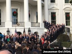 President Donald Trump praises the passage of a U.S. tax overhaul at an event on the South Lawn of the White House in Washington, Dec. 20, 2017.