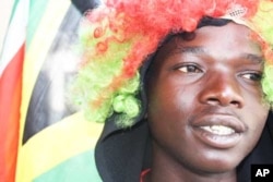 Vendor Blessing Mdunge is covered from head to toe in South African fan gear