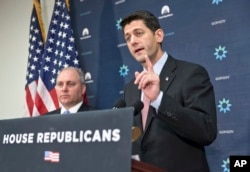 House Speaker Paul Ryan, joined by House Majority Whip Steve Scalise, left, meets with reporters on Capitol Hill, Nov. 17, 2015, following a GOP strategy session.