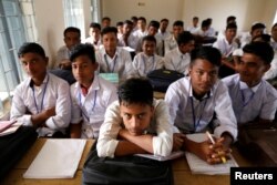 Bangladeshi students from the class where Rohingya students were expelled by the authorities are seen at Leda high school, Cox's Bazar, Bangladesh, February 9, 2019. Picture taken February 9, 2019. REUTERS/Jiraporn Kuhakan