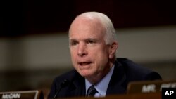 Senator John McCain speaks during the Senate Armed Services Committee hearing on Capitol Hill in Washington, July 7, 2015,