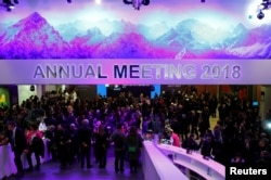 Attendees take part at a reception event after the Crystal Award ceremony during the World Economic Forum (WEF) annual meeting in Davos, Switzerland, Jan. 22, 2018.
