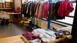 The clothes distribution station at Berlin's biggest restaurant Hofbraeu Berlin is ready for the homeless people, in Berlin, Germany, Thursday, Dec. 17, 2020. (AP Photo/Markus Schreiber)