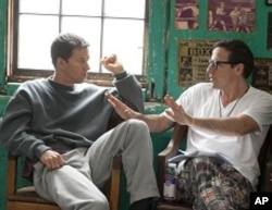 Left to right: Mark Wahlberg (as Micky Ward) with Director David O. Russell on the set of THE FIGHTER.