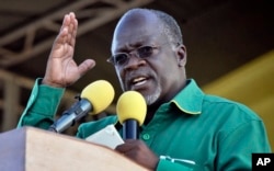 FILE - Tanzania President John Magufuli addresses a rally in Dar es Salaam, Tanzania, Oct. 23, 2015.