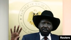 South Sudan's President Salva Kiir gestures during a news conference in Juba, Dec. 18, 2013.