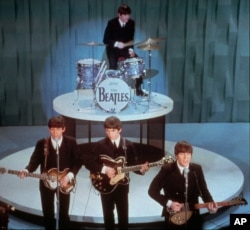 In this Feb. 9, 1964 picture, The Beatles perform at the "Ed Sullivan Show," in New York.