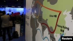 FILE - A map illustrating China's silk road economic belt and the 21st century maritime silk road, or the so-called "One Belt, One Road" megaproject, is displayed at the Asian Financial Forum in Hong Kong, Jan. 18, 2016.